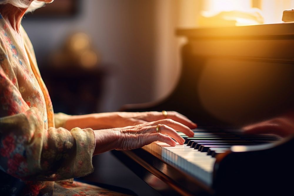 Old women hand playing piano keyboard musician pianist. 