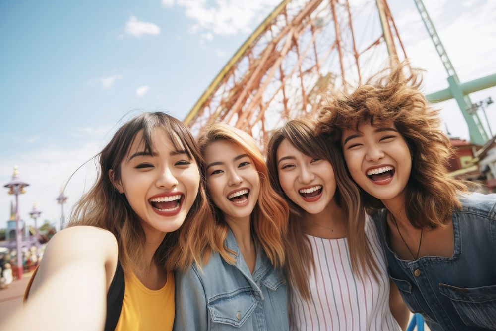 Group of friend take a selfie at theme park laughing summer adult. AI generated Image by rawpixel.