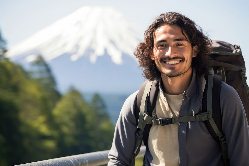 Smiling Latino man with backpack photography adventure mountain. AI generated Image by rawpixel.