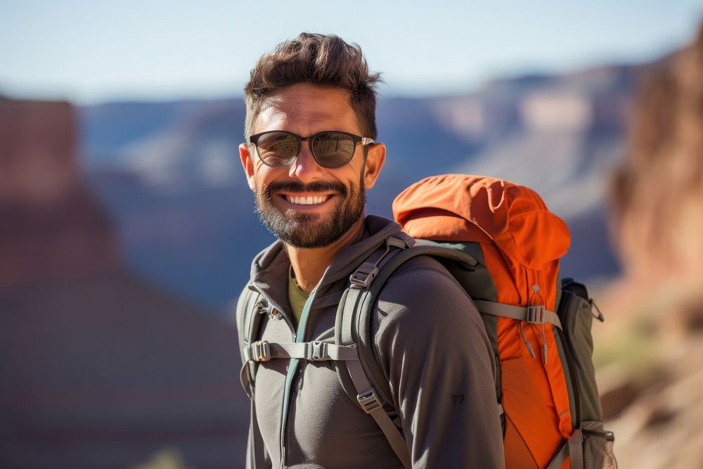 Smiling Latino man with backpack backpacking photography travel. AI generated Image by rawpixel.