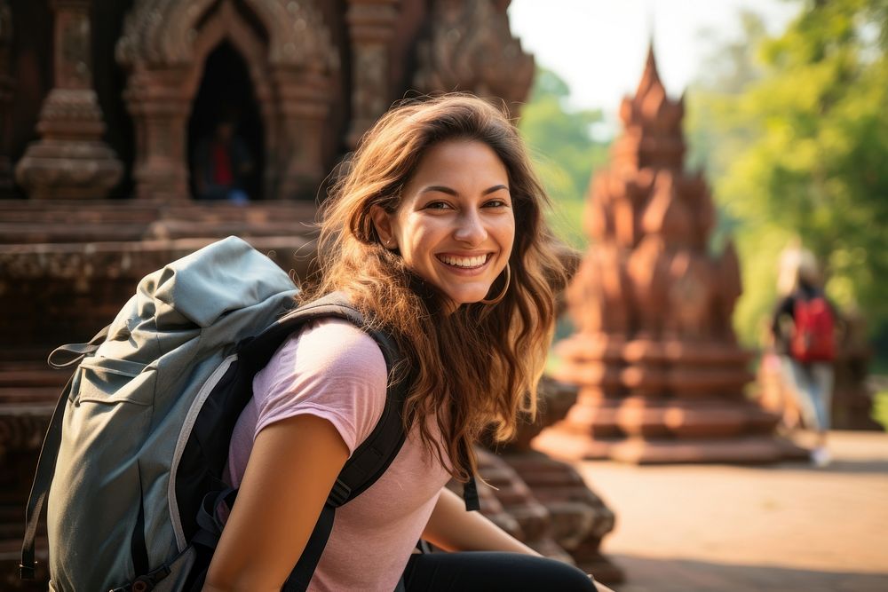 Smiling Latino women with backpack photography travel temple. AI generated Image by rawpixel.