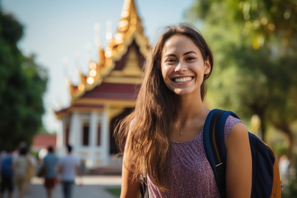 Smiling Latino women with backpack travel temple smile. AI generated Image by rawpixel.