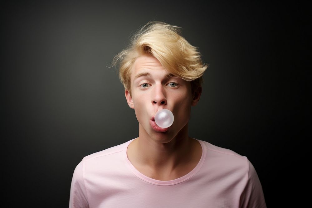Blond guy blow bubblegum adult moustache surprise. AI generated Image by rawpixel.