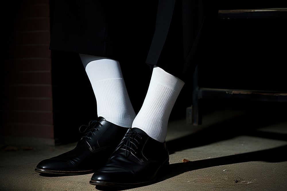 Sock footwear black white. AI generated Image by rawpixel.
