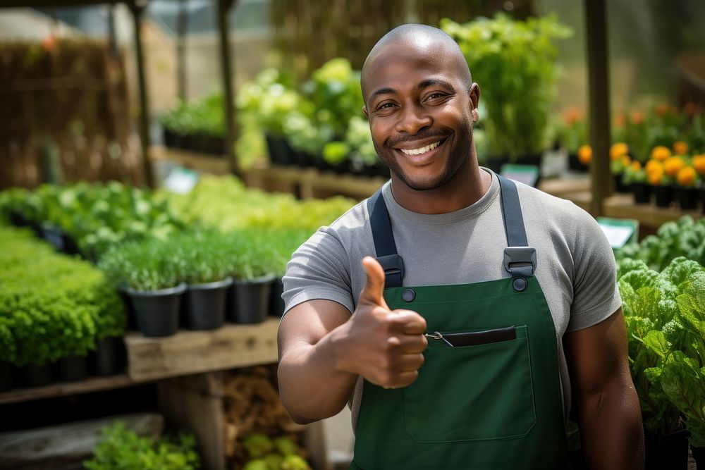 Black man gardener thumbs up gardening outdoors adult. AI generated Image by rawpixel.