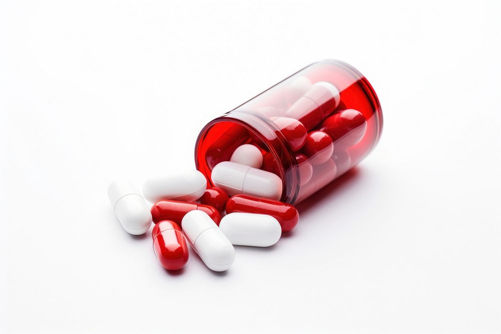 Red white capsule pill antioxidant medication. AI generated Image by rawpixel.