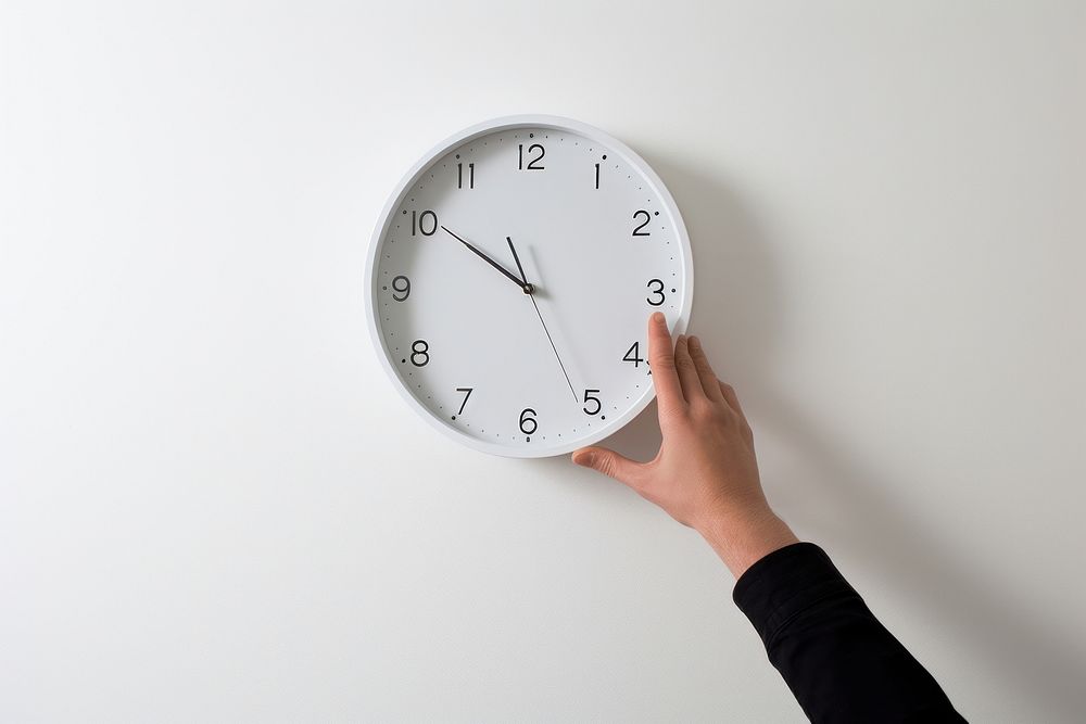 Looking clock at hand deadline accuracy number. AI generated Image by rawpixel.