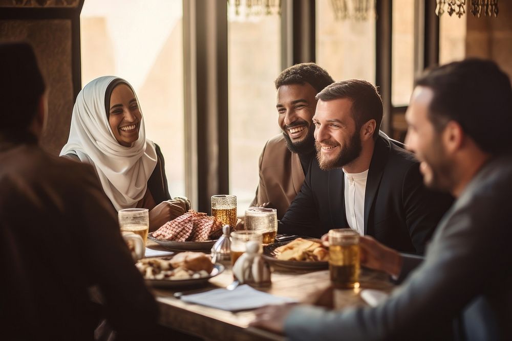 Black and Middle Eastern associates sitting talking adult. AI generated Image by rawpixel.