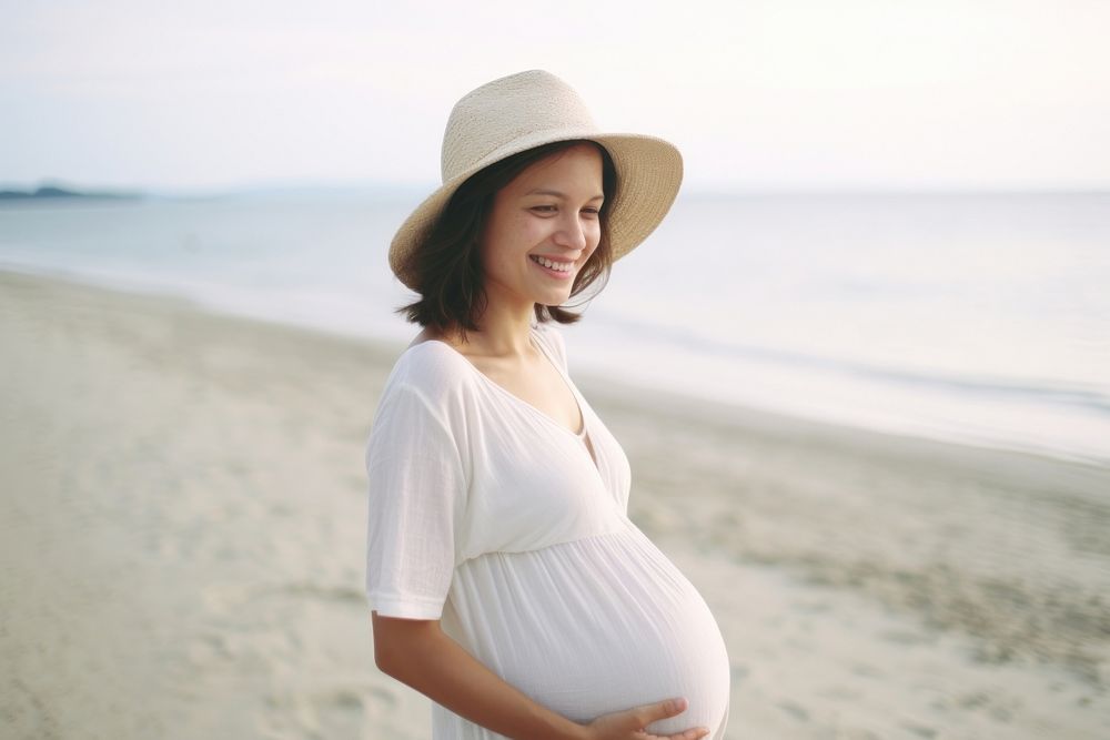 Pregnancy woman go to beach portrait adult photo. AI generated Image by rawpixel.