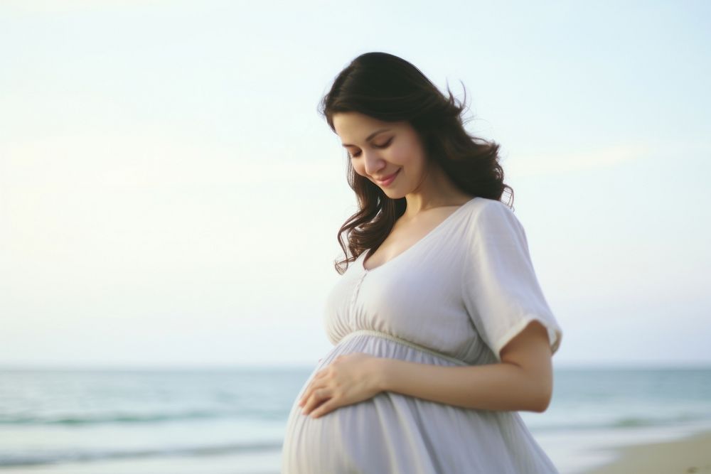 Pregnancy woman go to beach portrait adult dress. AI generated Image by rawpixel.