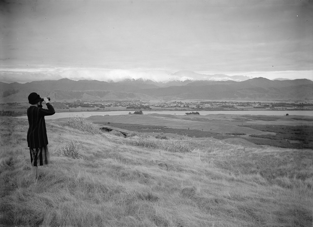 The Tararuas from Moutere trig station -- Levin and Lake Horowhenua in middle distance (19 June 1927) by Leslie Adkin.