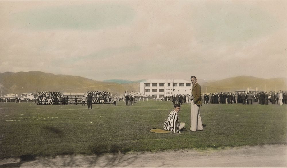 [Two men on sports field] (1920s to 1930s) by Roland Searle.