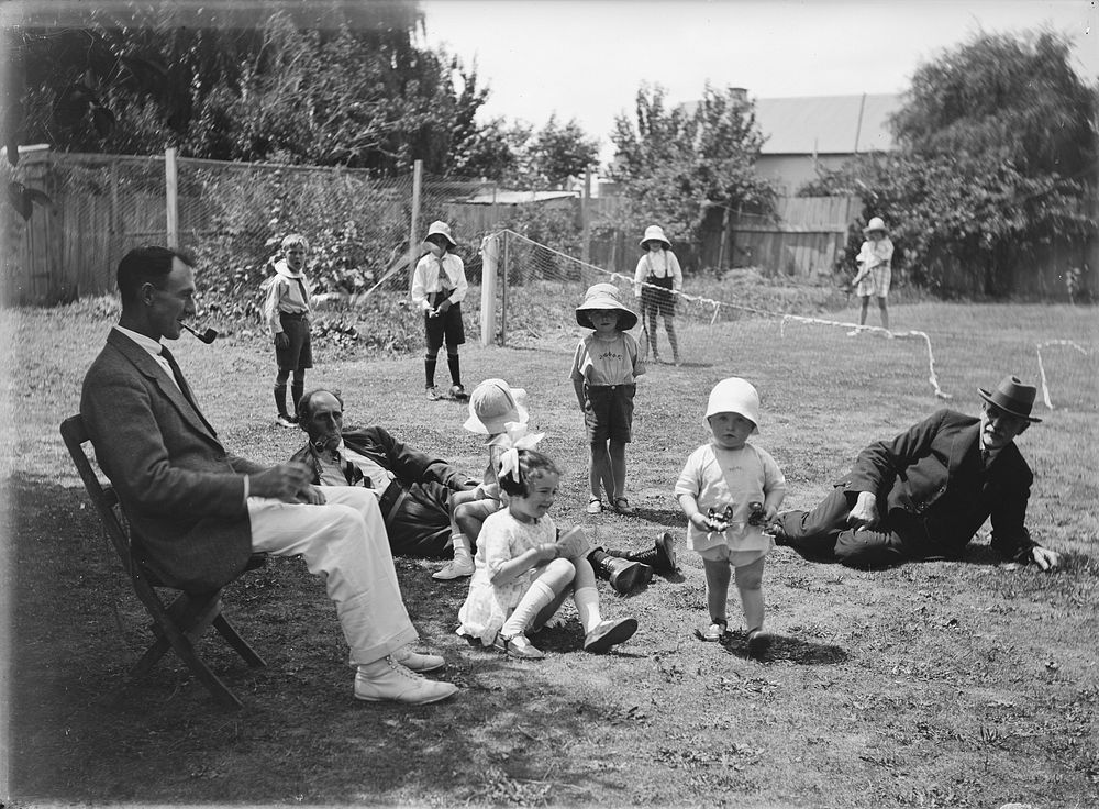 Men supervise children playing (circa 1925) by Leslie Adkin.