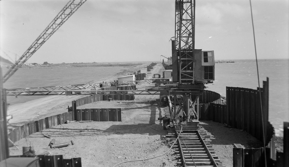 Steel sheet piling on west side of Rongotai reclaimation (12 December 1955) by Leslie Adkin.