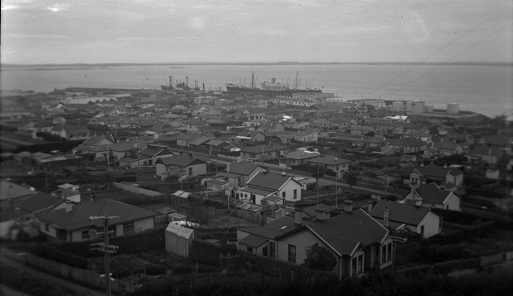 Bluff harbour and town (30 April 1950) by Leslie Adkin.