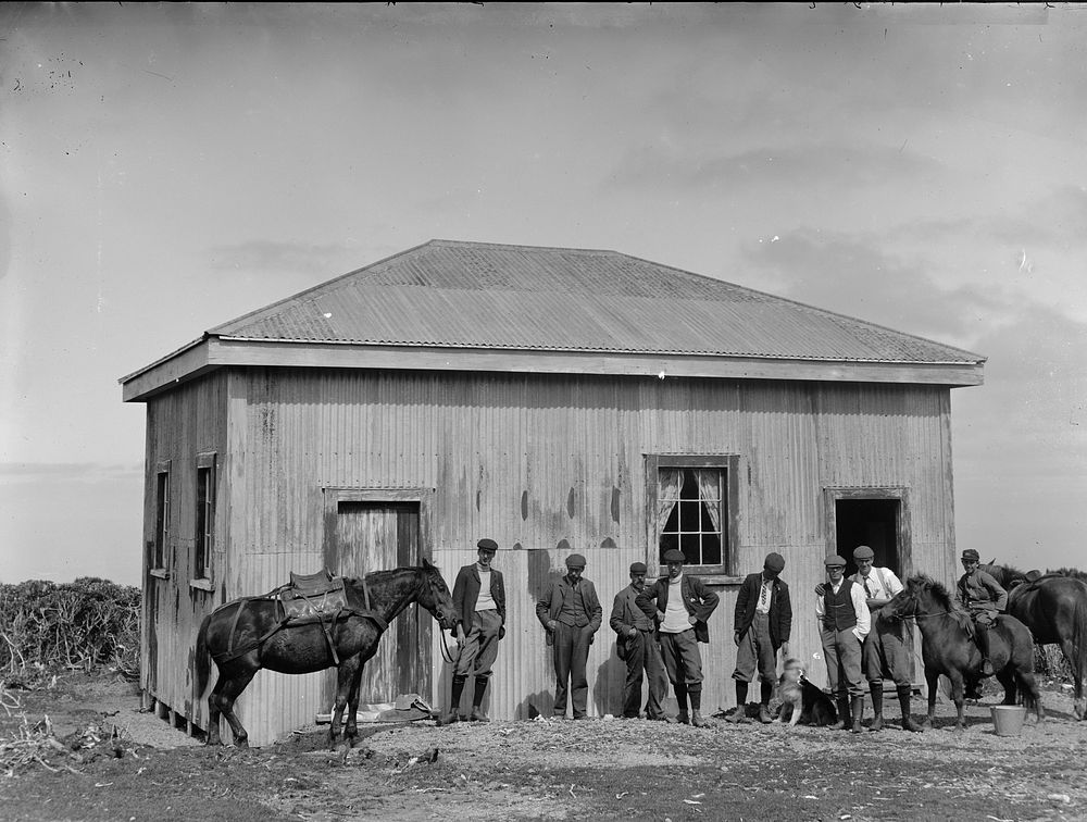 Men Outside Tin Shed (circa 1908) by Fred Brockett.