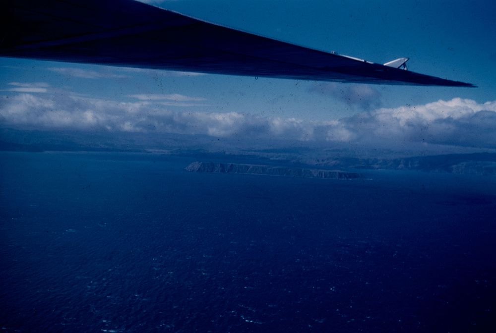 Mana Island and the en. (entrance) to Porirua Harbour (24 March 1959) by Leslie Adkin.