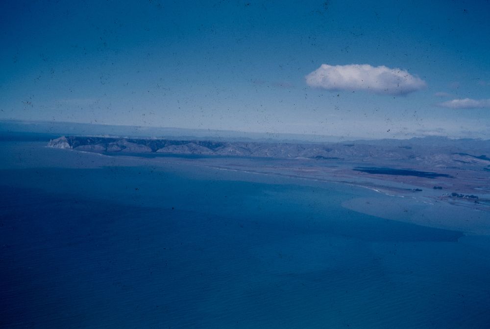 White Cliffs, Wairau Boulder Bank, Wairau Bar (River mouth) across Cloudy Bay (24 March 1959) by Leslie Adkin.