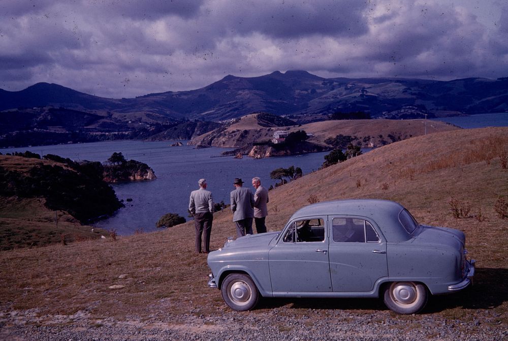 The submerged divide in Otago Harbour from the Portobello side, Mt. Cargill cloud-capped in central distance (24 March 1959…