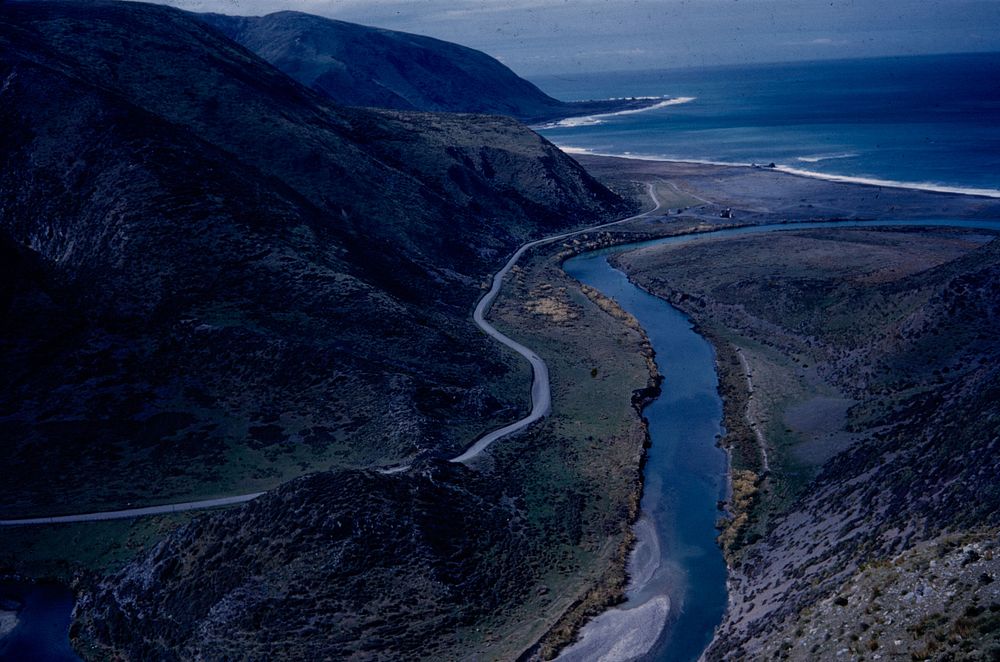 Outlet gorge of Wainuiomata River with Te Raina pa-site .... (20 March 1960) by Leslie Adkin.