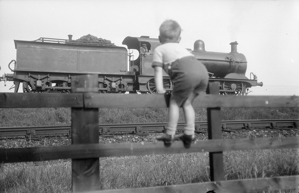 Michael Johnson as seen watching train, London by Eric Lee Johnson.