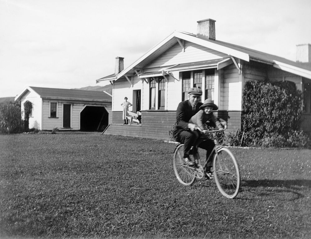 Clyde and Elsdon Clark on bike (circa 1923).