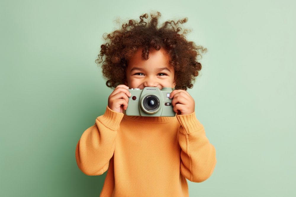 Kid taking photo portrait camera photographing. AI generated Image by rawpixel.