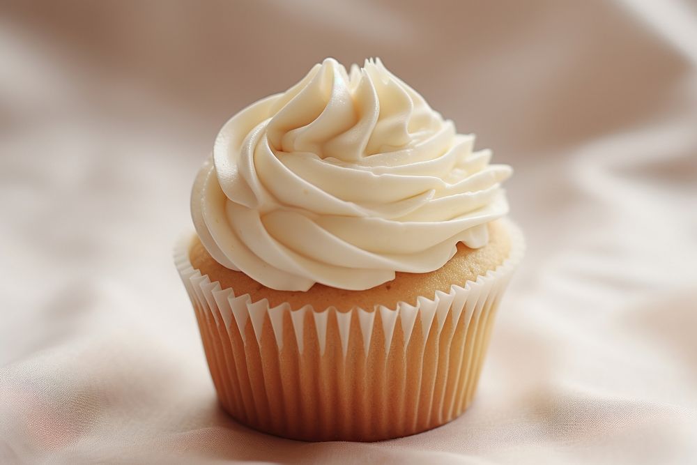 Home made white cupcake dessert icing cream. AI generated Image by rawpixel.