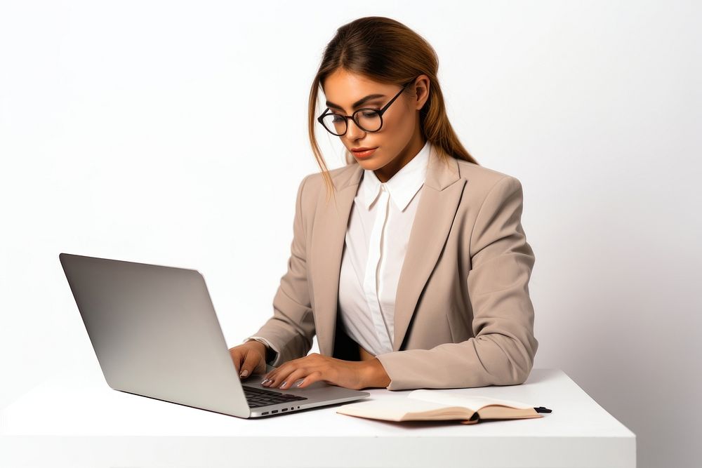 Businesswoman working computer sitting laptop. AI generated Image by rawpixel.