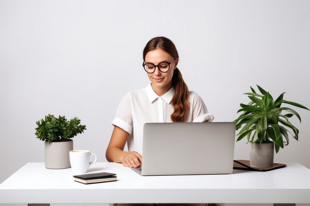 Attractive young businesswoman furniture computer glasses. AI generated Image by rawpixel.