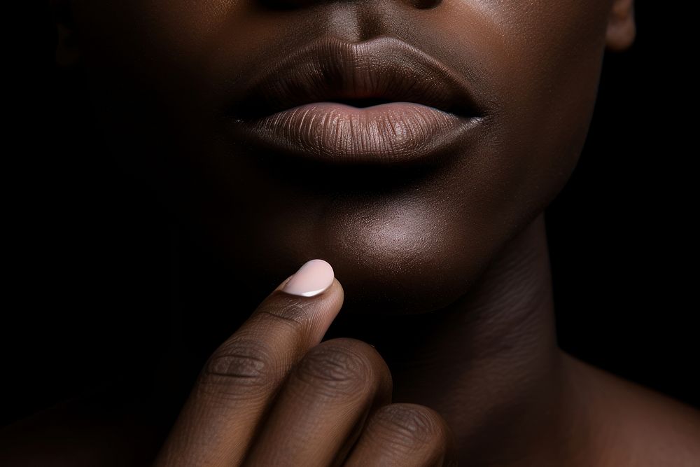 Man applying lipstick adult black skin. AI generated Image by rawpixel.