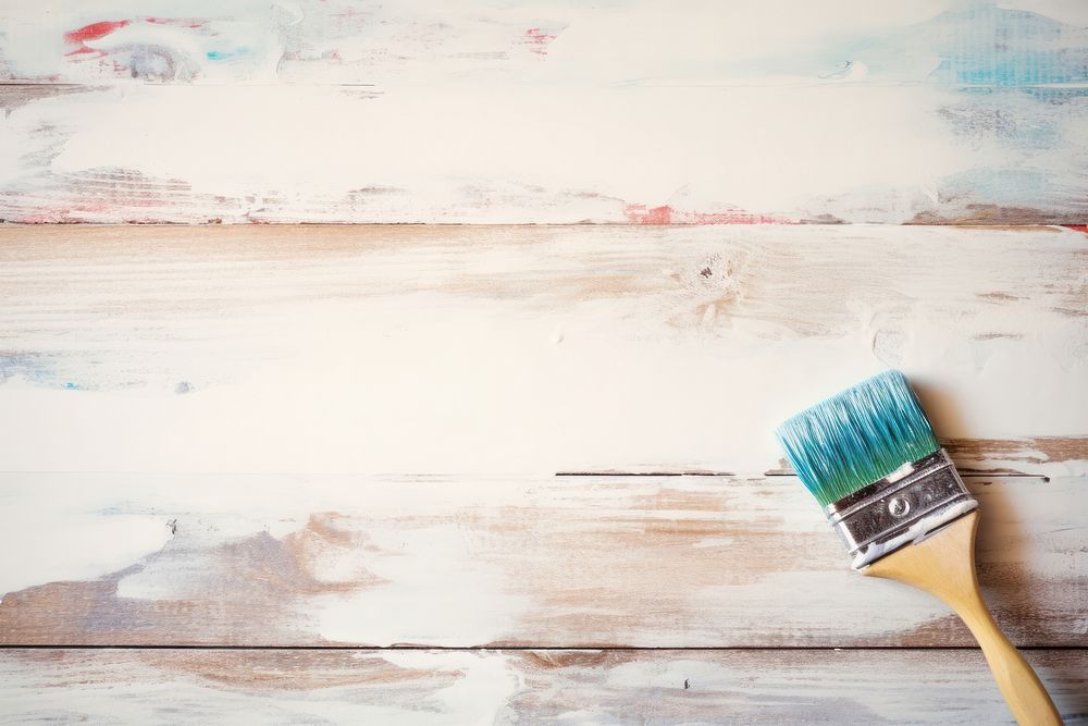 Hand holding paint roller backgrounds brush wood. AI generated Image by rawpixel.