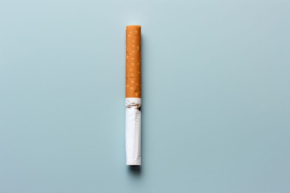 A break in half of cigarette smoking smoke ashtray. AI generated Image by rawpixel.