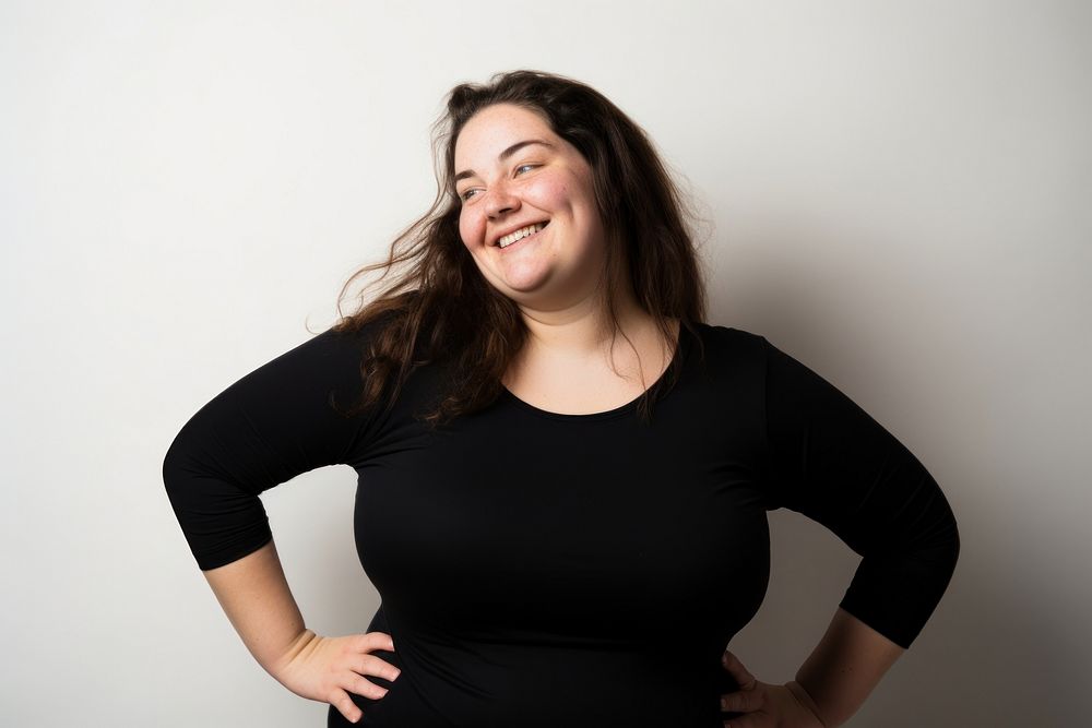 Chubby woman laughing portrait smiling. AI generated Image by rawpixel.