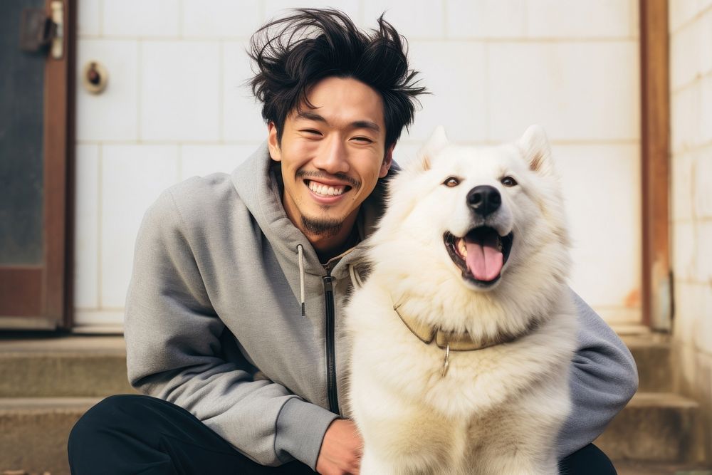 Korean man smile dog mammal. AI generated Image by rawpixel.