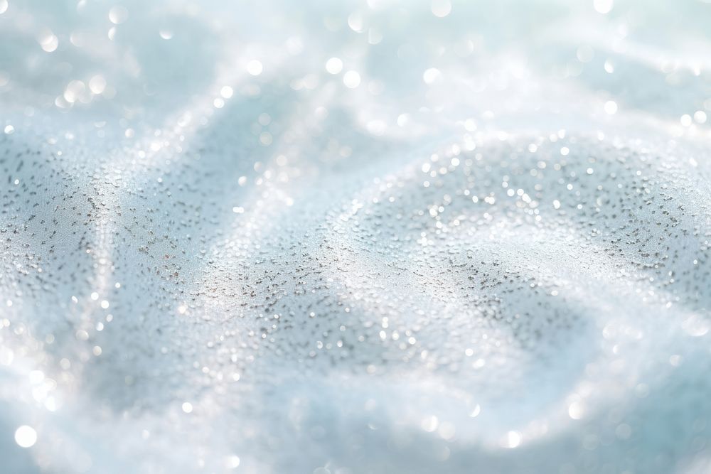 Sea texture with sparkling transparent backgrounds defocused. AI generated Image by rawpixel.