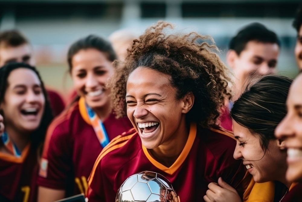 Football woman team holding trophy cheerful laughing sports. AI generated Image by rawpixel.