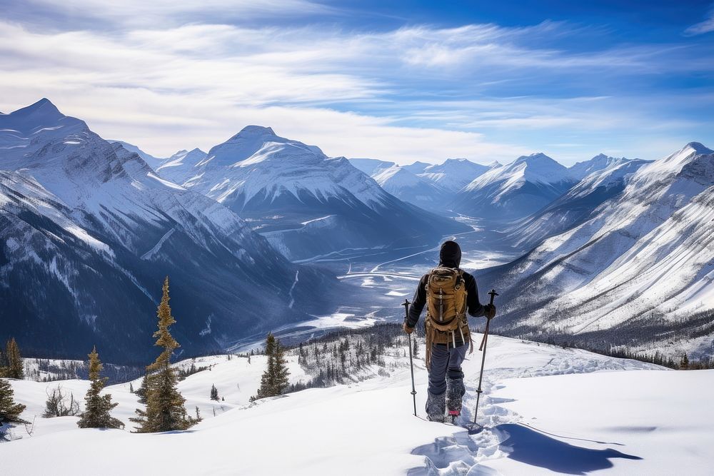 Man with snowshoes hiking backpacking recreation. AI generated Image by rawpixel.