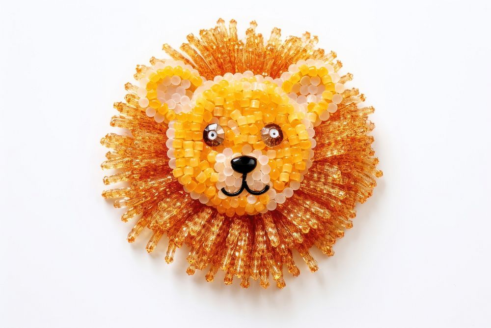 Cute lion jewelry brooch bead. AI generated Image by rawpixel.
