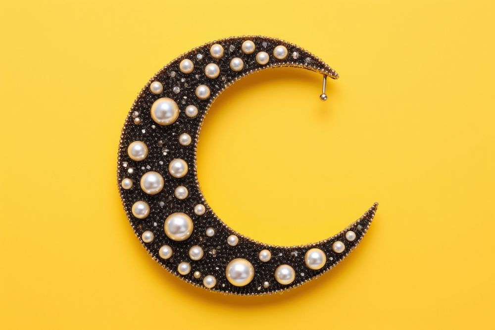 The moon necklace jewelry yellow. AI generated Image by rawpixel.