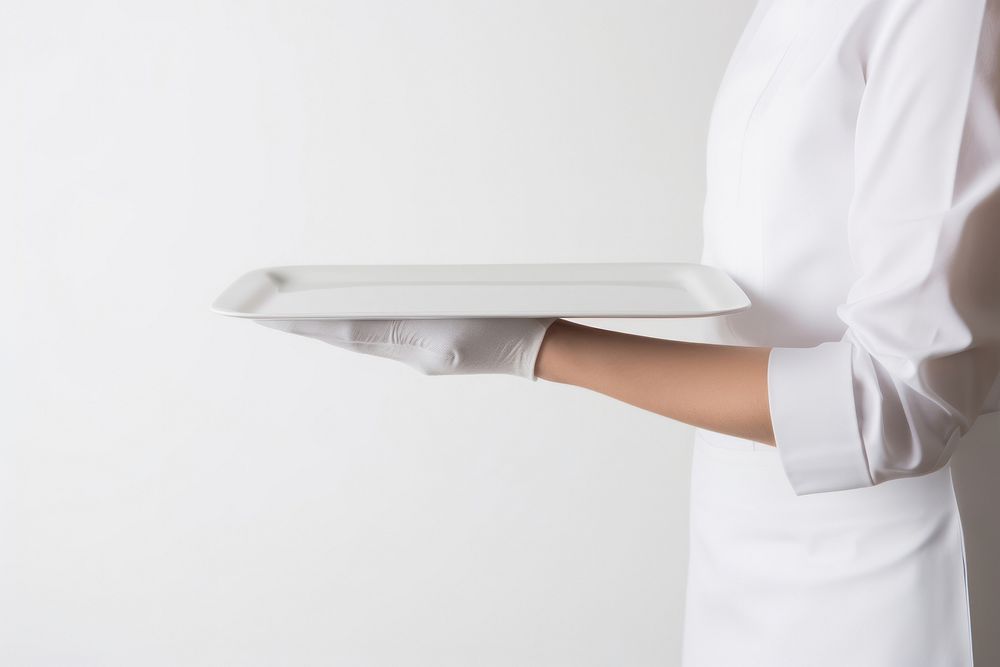 A man waitress hand is holding up a platter adult white tray. AI generated Image by rawpixel.