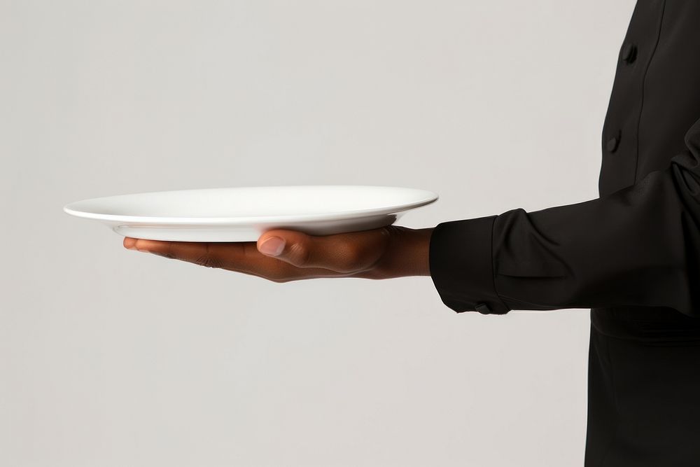 A man waitress hand is holding up a platter plate adult food. AI generated Image by rawpixel.