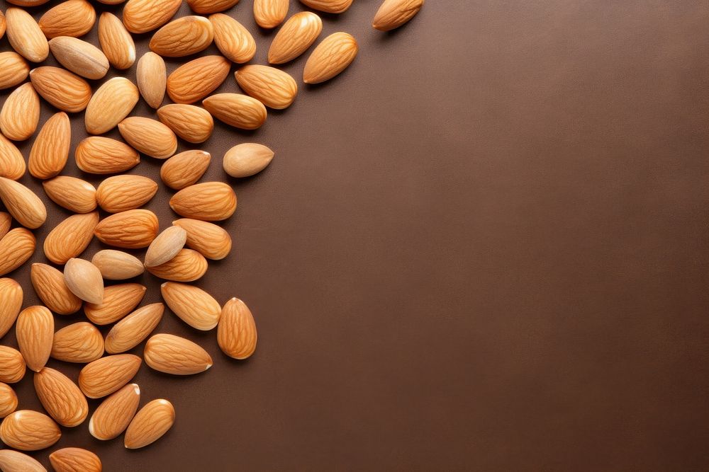 Almonds backgrounds food seed. AI generated Image by rawpixel.