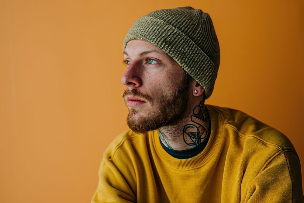 Man wearing a knitted beanie photography portrait adult. AI generated Image by rawpixel.