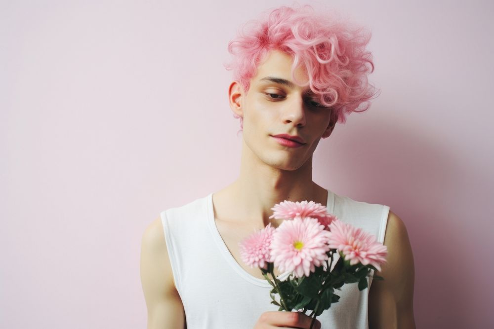 A man with pink hairs smiling flower adult. 