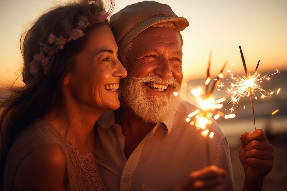 Elder man and girl celebrate holding sparkler laughing portrait outdoors. AI generated Image by rawpixel.