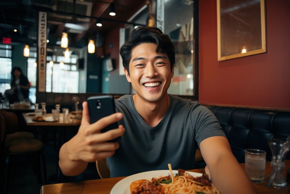 Vlog restaurant smiling selfie. AI generated Image by rawpixel.