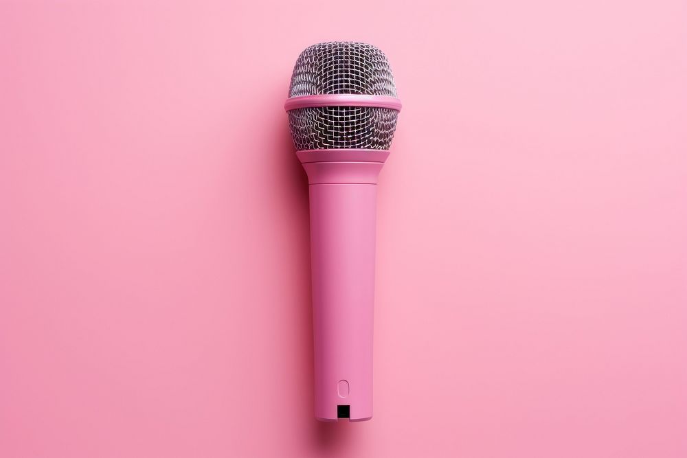 A pink microphone pink background performance technology. AI generated Image by rawpixel.