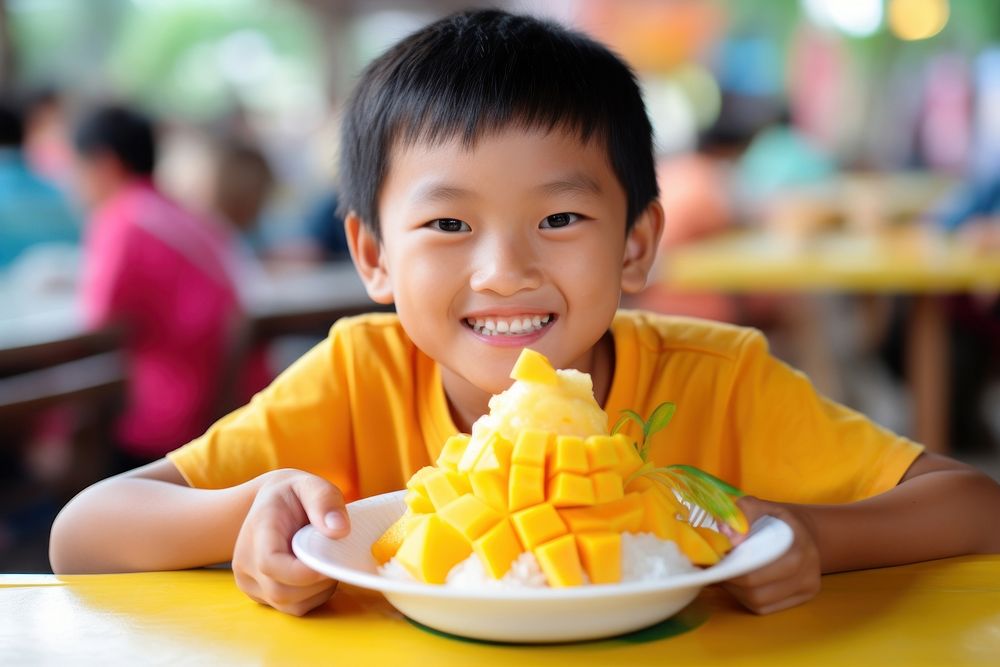 Toppings mango food eating child. AI generated Image by rawpixel.