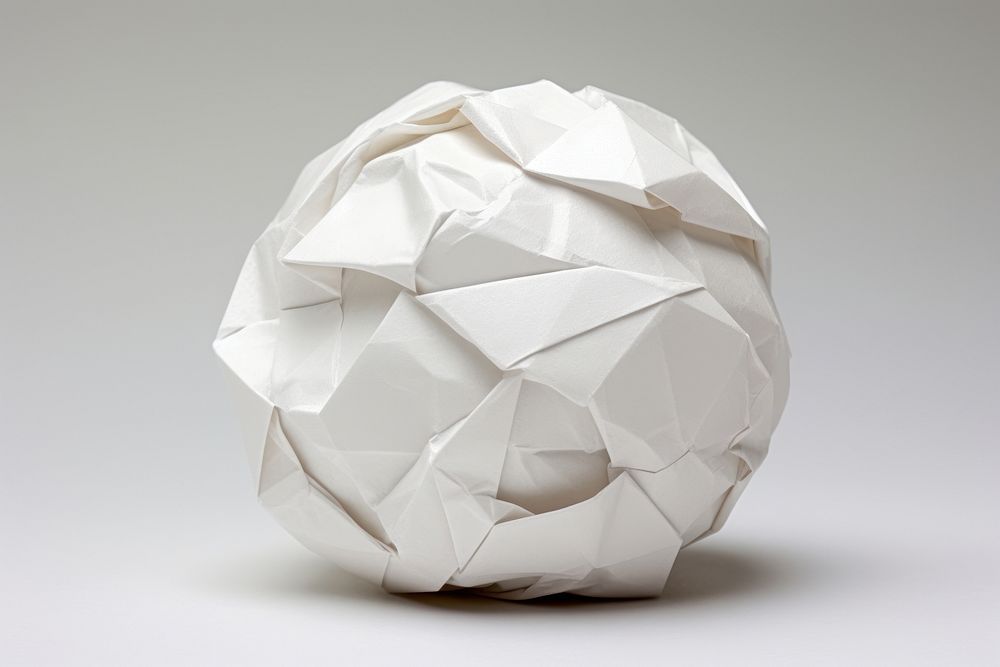 Crumpled paper ball origami white art. AI generated Image by rawpixel.